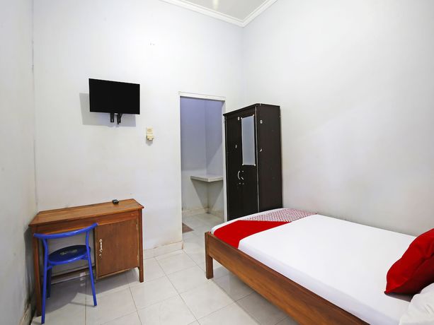 Imagen de la habitación del Hotel Collection O 91449 Griya Ampenan Residence. Foto 9