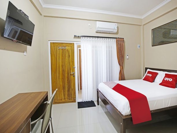 Imagen de la habitación del Hotel Collection O 91449 Griya Ampenan Residence. Foto 13