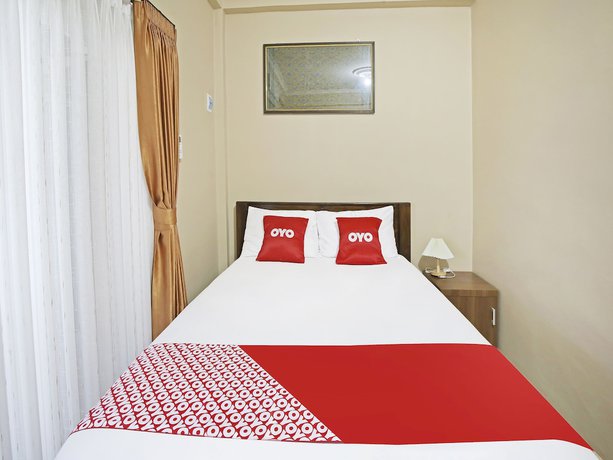 Imagen de la habitación del Hotel Collection O 91449 Griya Ampenan Residence. Foto 14