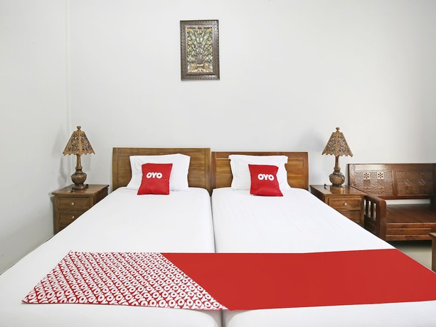 Imagen de la habitación del Hotel Collection O 91449 Griya Ampenan Residence. Foto 16