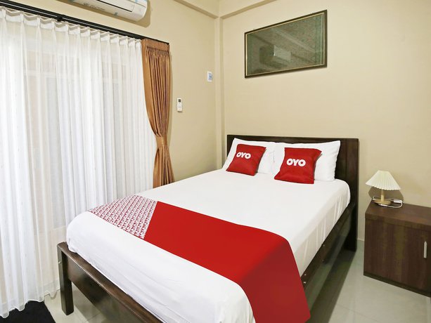 Imagen de la habitación del Hotel Collection O 91449 Griya Ampenan Residence. Foto 17