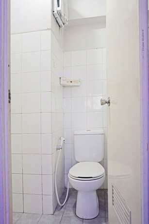 Imagen de la habitación del Hotel Collection O 91470 De Royal Sentra Timur. Foto 20