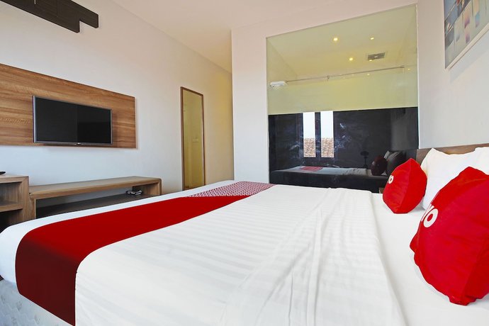 Imagen de la habitación del Hotel Collection O 91472 The Regia Dago By Ultimo. Foto 4