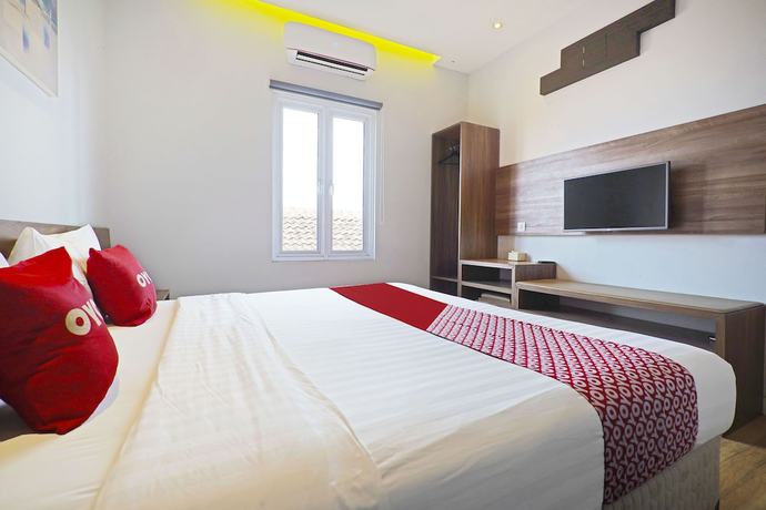 Imagen de la habitación del Hotel Collection O 91472 The Regia Dago By Ultimo. Foto 8
