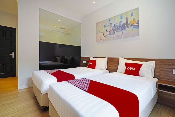 Imagen de la habitación del Hotel Collection O 91472 The Regia Dago By Ultimo. Foto 10
