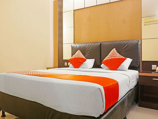 Imagen de la habitación del Hotel Collection O 91565 Grand Populer. Foto 14