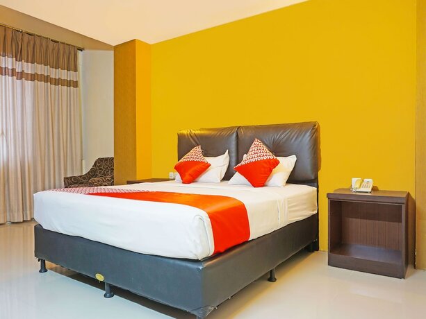Imagen de la habitación del Hotel Collection O 91565 Grand Populer. Foto 17