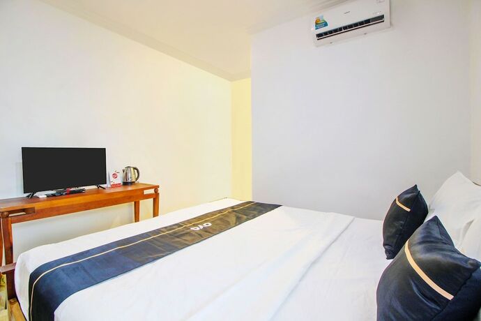 Imagen de la habitación del Hotel Collection O 91605 Nexdeco House Homestay Syariah. Foto 14