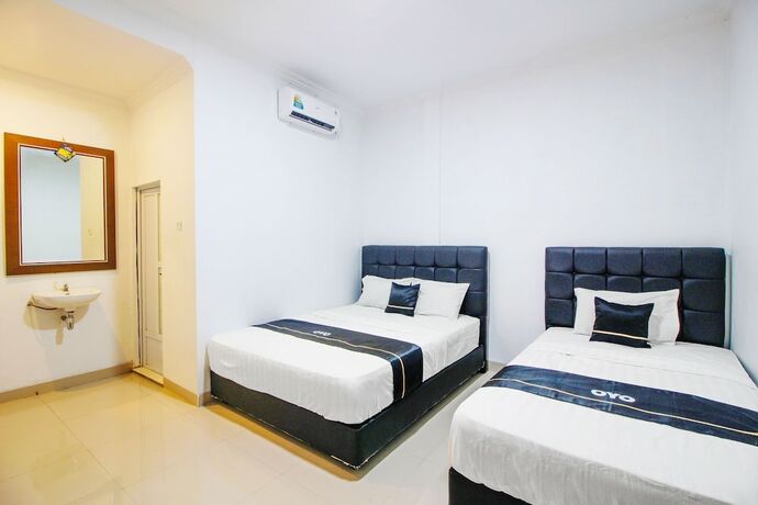 Imagen de la habitación del Hotel Collection O 91605 Nexdeco House Homestay Syariah. Foto 15