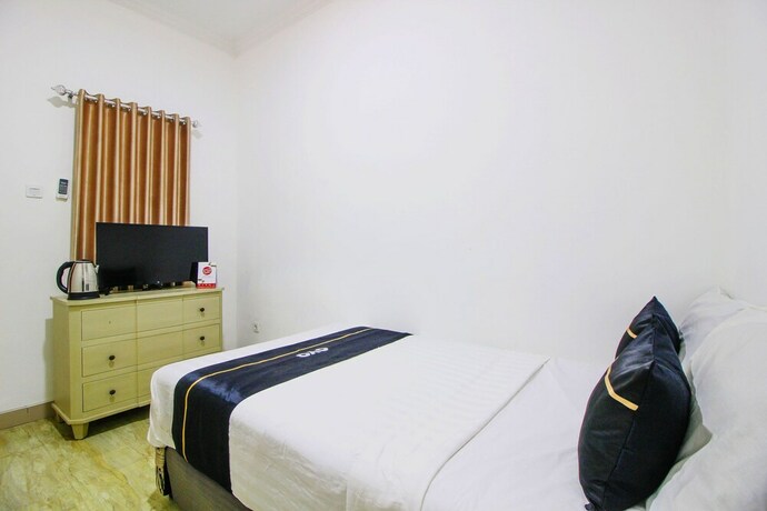 Imagen de la habitación del Hotel Collection O 91605 Nexdeco House Homestay Syariah. Foto 19