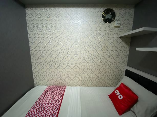Imagen de la habitación del Hotel Collection O 92099 A99 Property. Foto 8