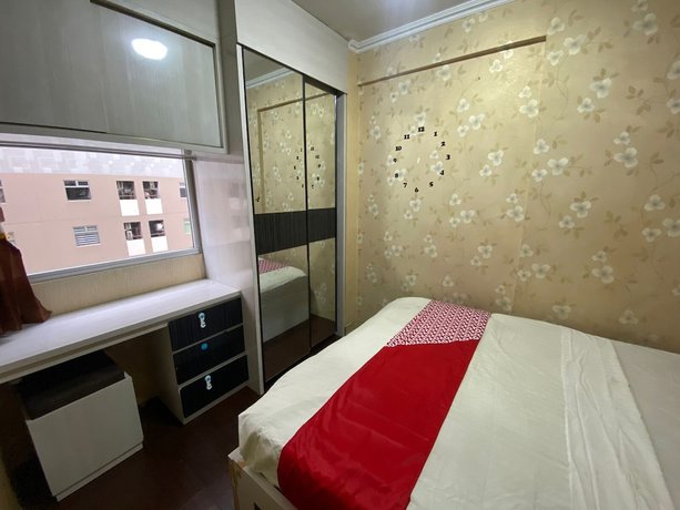Imagen de la habitación del Hotel Collection O 92099 A99 Property. Foto 12
