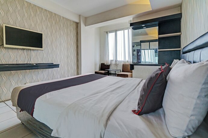 Imagen de la habitación del Hotel Collection O 92643 Emerald Apartement By Tahha Hospitality. Foto 20
