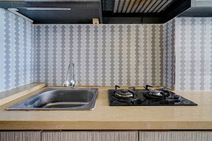 Imagen general del Hotel Collection O 92643 Emerald Apartement By Tahha Hospitality. Foto 17