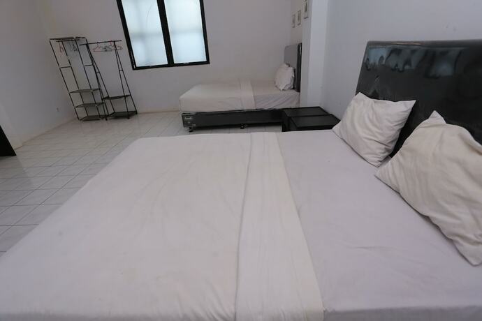 Imagen de la habitación del Hotel Collection O 92739 Pintu Besar. Foto 18