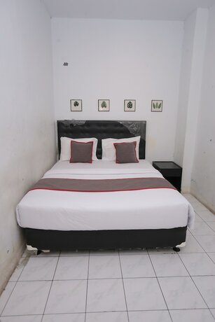 Imagen de la habitación del Hotel Collection O 92739 Pintu Besar. Foto 19