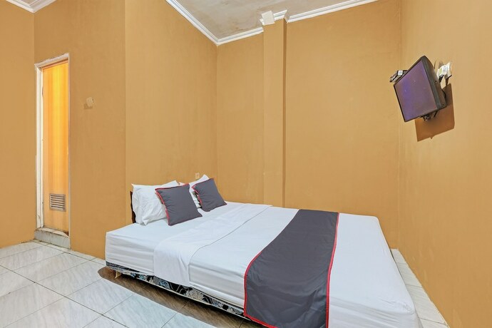 Imagen de la habitación del Hotel Collection O 92864 Mitra Residence. Foto 18