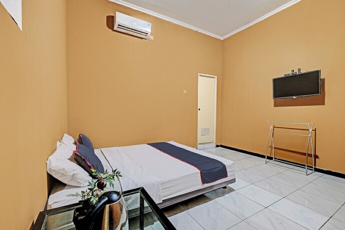 Imagen de la habitación del Hotel Collection O 92864 Mitra Residence. Foto 19