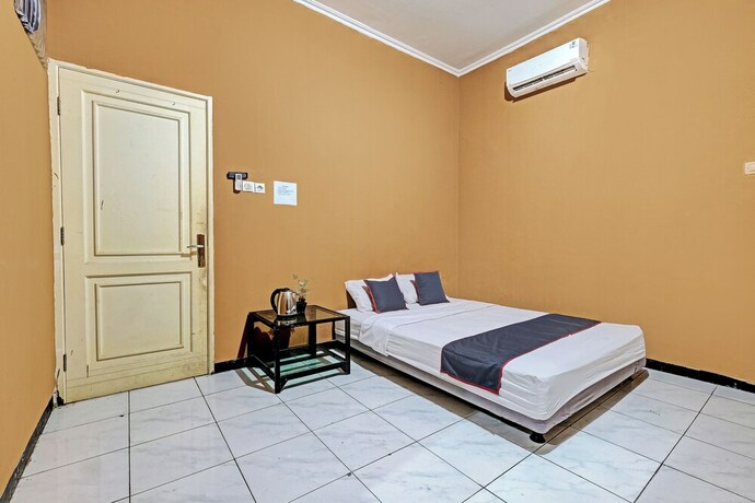 Imagen de la habitación del Hotel Collection O 92864 Mitra Residence. Foto 20