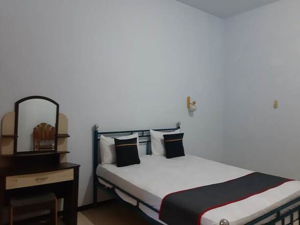 Imagen de la habitación del Hotel Collection O 92868 Nusantara. Foto 15