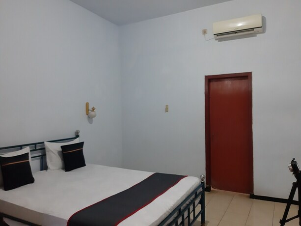 Imagen de la habitación del Hotel Collection O 92868 Nusantara. Foto 16