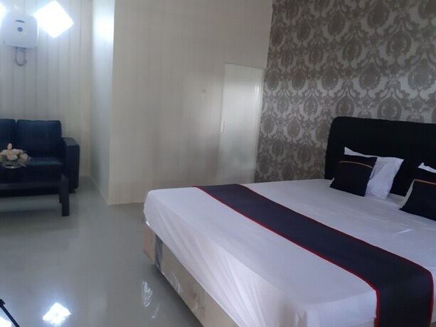 Imagen de la habitación del Hotel Collection O 92868 Nusantara. Foto 17