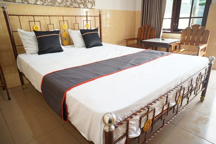 Imagen de la habitación del Hotel Collection O 92868 Nusantara. Foto 18