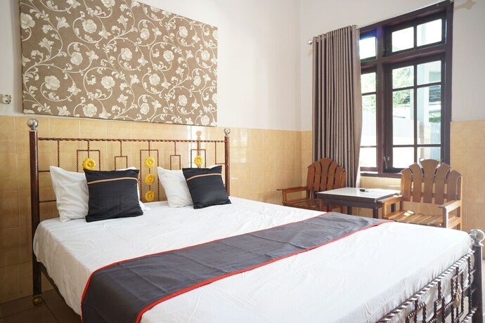 Imagen de la habitación del Hotel Collection O 92868 Nusantara. Foto 19