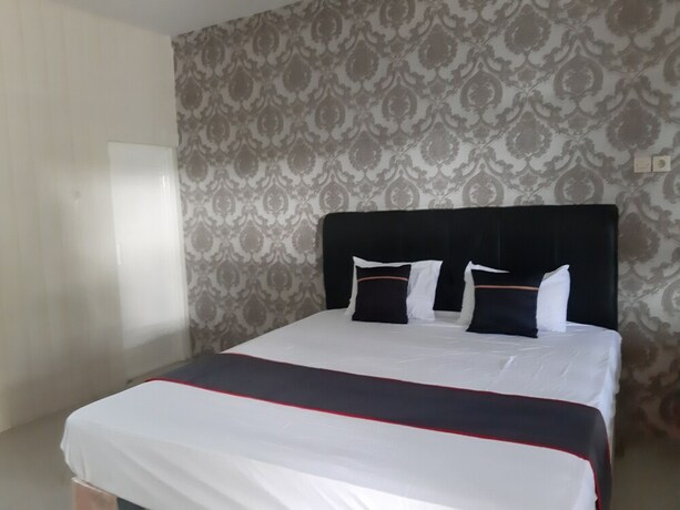 Imagen de la habitación del Hotel Collection O 92868 Nusantara. Foto 20