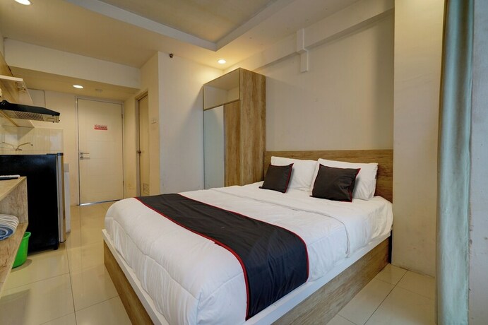Imagen de la habitación del Hotel Collection O 92870 Apartement Grand Sentraland Karawang By Ipul. Foto 19