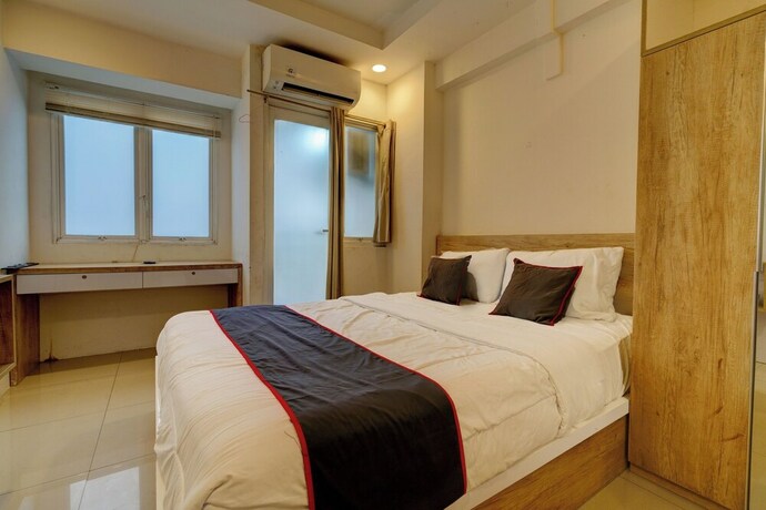Imagen de la habitación del Hotel Collection O 92870 Apartement Grand Sentraland Karawang By Ipul. Foto 20