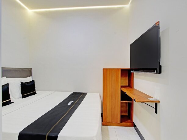Imagen de la habitación del Hotel Collection O 92972 Gaharu. Foto 19