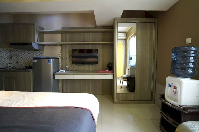 Imagen de la habitación del Hotel Collection O 92981 Apartemen The Jarrdin By Gold Suites Property. Foto 18