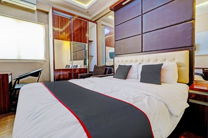 Imagen de la habitación del Hotel Collection O 93070 Apartemen The Suite Metro By Sultan Property Ii. Foto 17