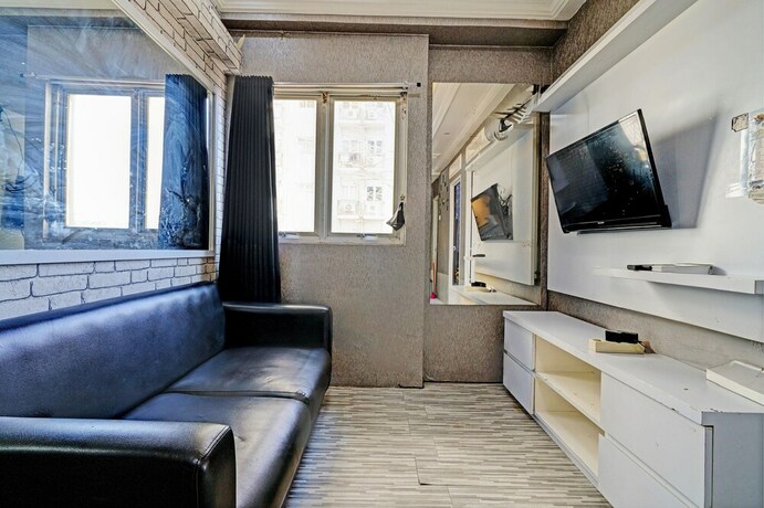 Imagen de la habitación del Hotel Collection O 93070 Apartemen The Suite Metro By Sultan Property Ii. Foto 20