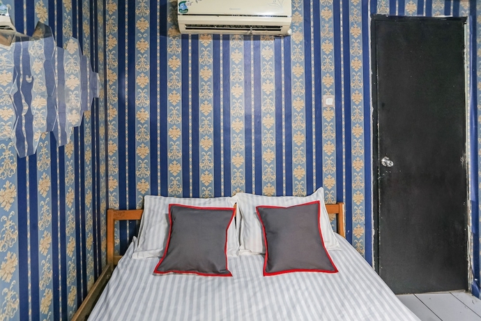 Imagen de la habitación del Hotel Collection O 93646 Grand Property By. Foto 5