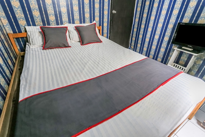 Imagen de la habitación del Hotel Collection O 93646 Grand Property By. Foto 6
