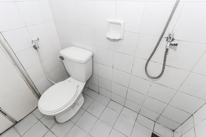 Imagen de la habitación del Hotel Collection O 93646 Grand Property By. Foto 14