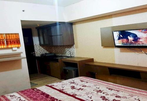 Imagen general del Hotel Collection O 93707 Rooms By U, Kelapa Dua. Foto 14