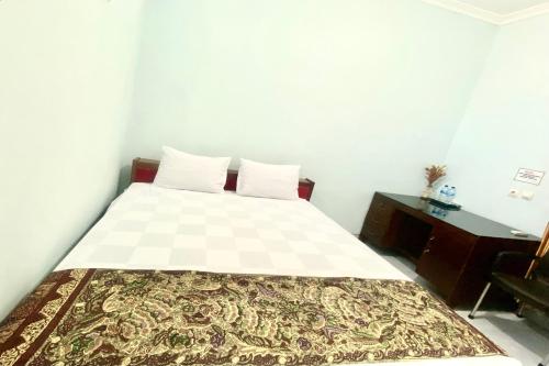 Imagen de la habitación del Hotel Collection O 93942 Griya Singgah Berkah Syariah. Foto 20