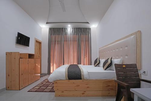 Imagen de la habitación del Hotel Collection O Aditya Residency UK. Foto 19
