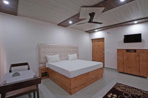 Imagen de la habitación del Hotel Collection O Aditya Residency UK. Foto 20