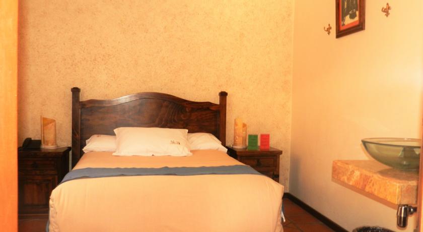 Imagen de la habitación del Hotel Collection O Al Otro Lado Del Rio, Puebla. Foto 2