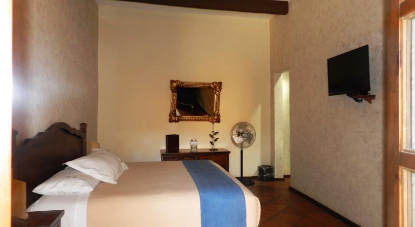 Imagen de la habitación del Hotel Collection O Al Otro Lado Del Rio, Puebla. Foto 3