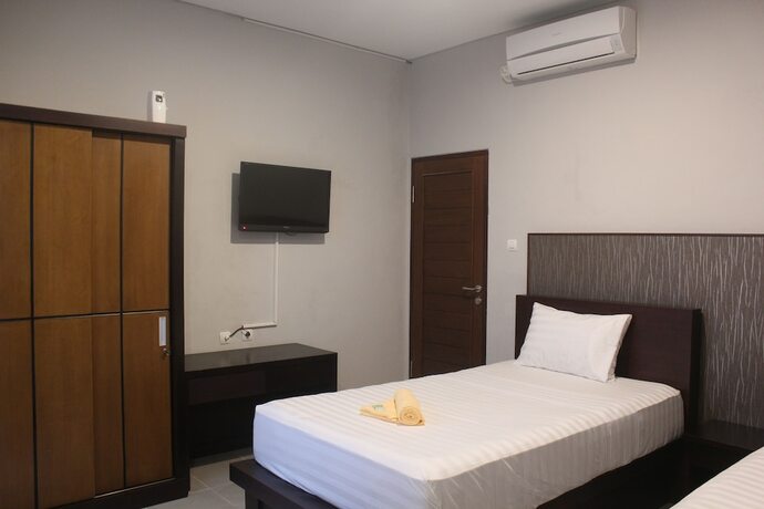 Imagen de la habitación del Hotel Collection O Bali near Kedonganan Beach. Foto 20