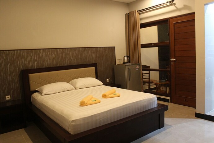 Imagen de la habitación del Hotel Collection O Bali near Kedonganan Beach. Foto 26