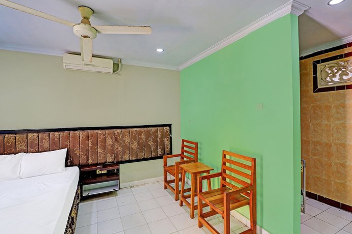 Imagen de la habitación del Hotel Collection O Bali near Terminal Ubung. Foto 2