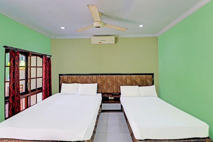 Imagen de la habitación del Hotel Collection O Bali near Terminal Ubung. Foto 4