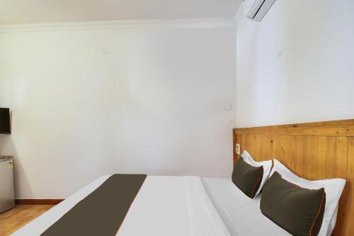 Imagen de la habitación del Hotel Collection O Bay 11. Foto 18