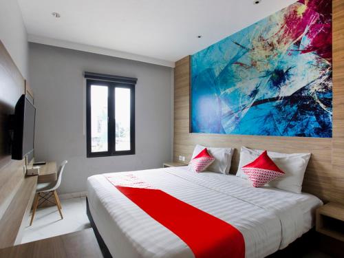 Imagen de la habitación del Hotel Collection O Bekasi Timur Near Gedung Juang Formerly Regia Tambun. Foto 11